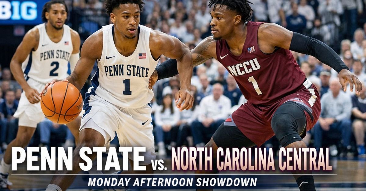 Penn State men’s basketball player drives past a North Carolina Central defender during a nonconference game at the Bryce Jordan Center.